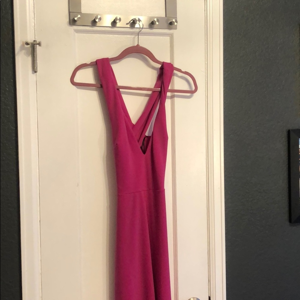 Crossed back pant leg romper